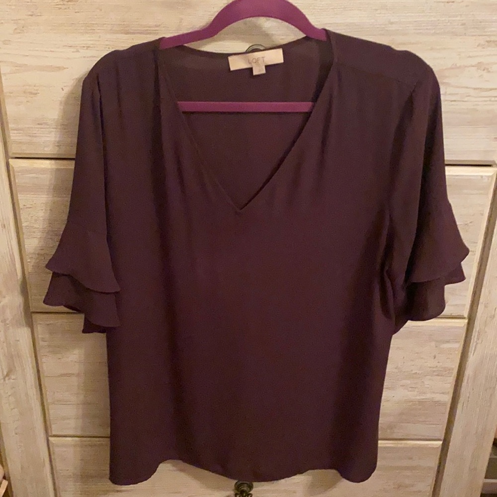 Blouse in eggplant color